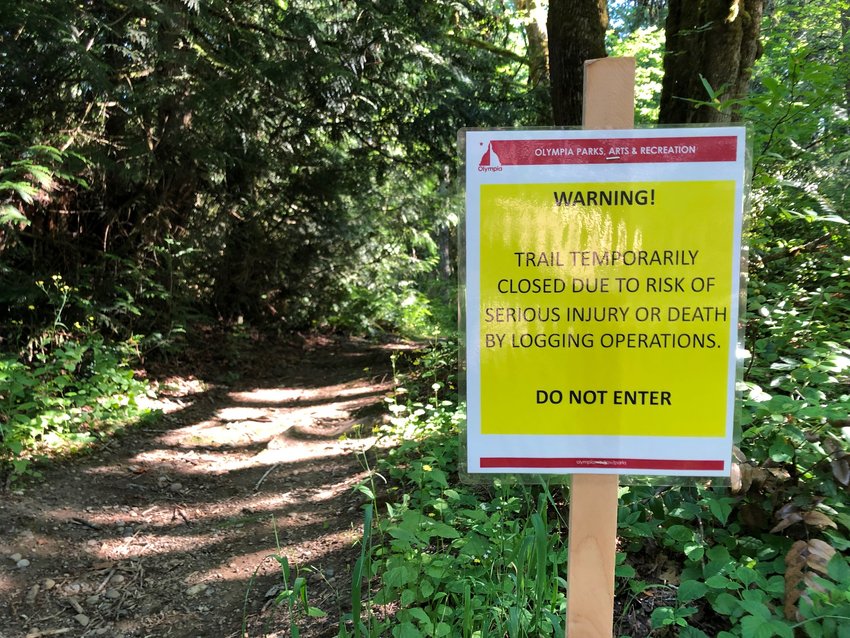 Visitors on June 27, 2022 arrived at the Cooper Crest Forest to see the these signs warning would-be hikers away from the property.