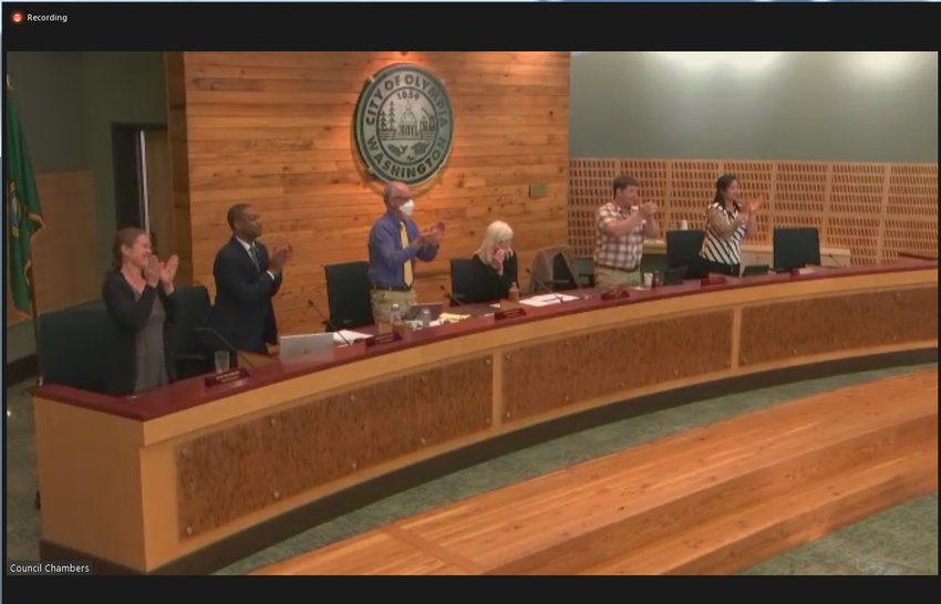 At the July 19, 2022 Olympia city council meeting, council members made a standing ovation to honor the men and women of Downtown Ambassadors and Clean Team for their 10-year service to the community.
