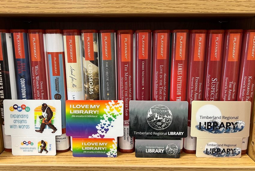 Timberland Regional Library cards are displayed.