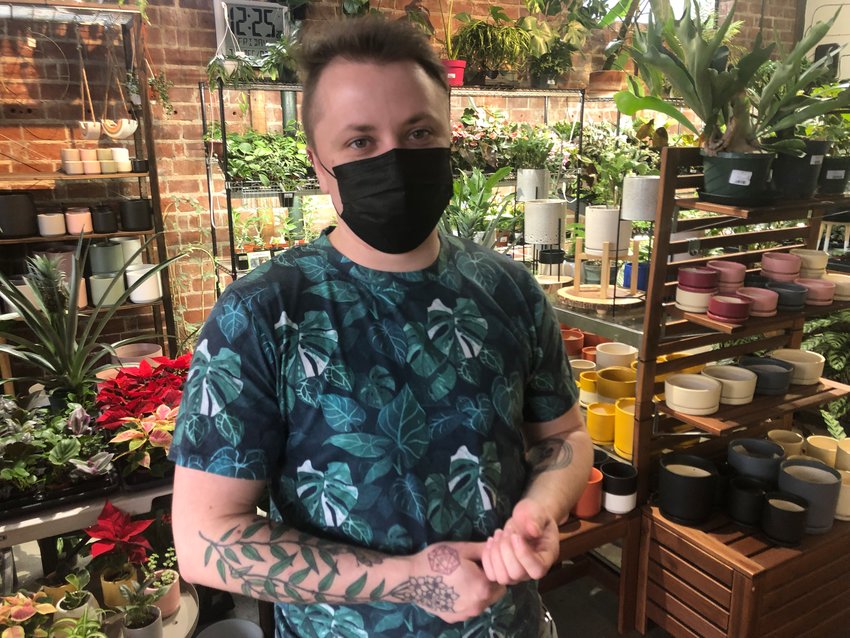Proprietor Alden Davis' appreciation of plants is proven by his tattoos -- ask him the names of each.