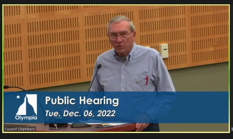 Seven community members, including former Olympia Mayor Bob Jacobs, above, participated in the public hearing for the proposed Regional Fire Authority at the Olympia City Council meeting held December 6, 2022.