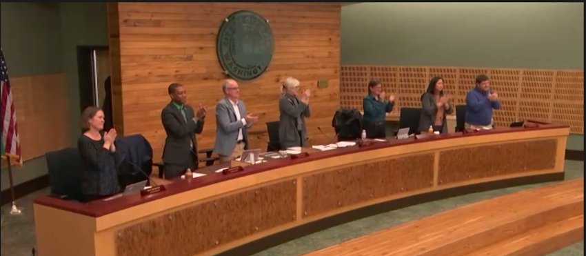 The community workgroup received a standing ovation from Olympia councilmembers for completing its work for the Reimagining Public Safety during the city council meeting on December 6, 2022.