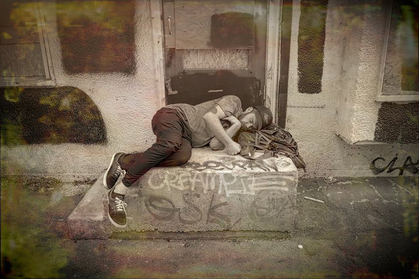 Hard Bed:  This individual slept on a bed of concrete in Fleetwood Alley in Olympia in March 2023.