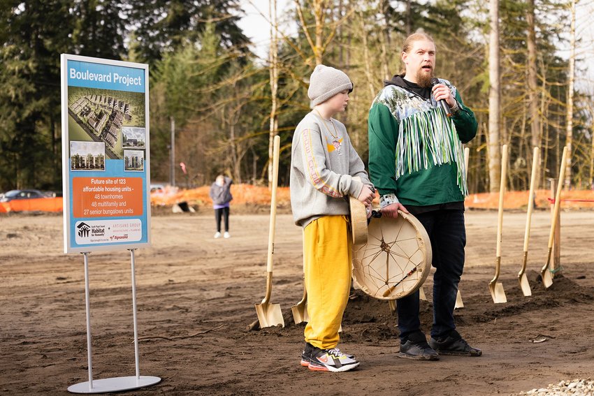 Ethan Paige and Clay Koch from the Cowlitz Indian Tribe sang two songs to welcome the T&acirc;l&iacute;cn development.