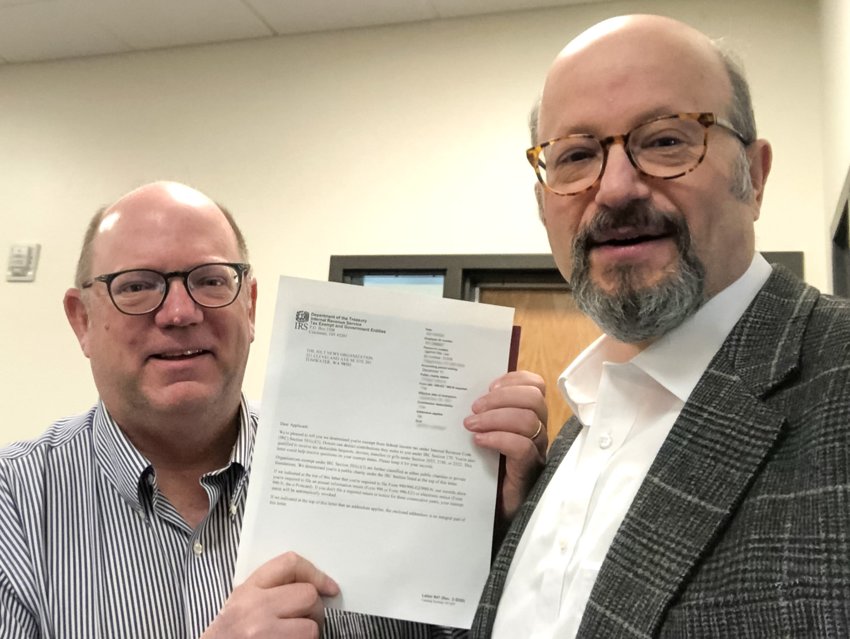 Michael Cade, executive director of the Thurston Economic Development Council and the Center for Business &amp; Innovation, received the IRS letter from Danny Stusser, executive director of The JOLT News Organization, on April 5, 2023.