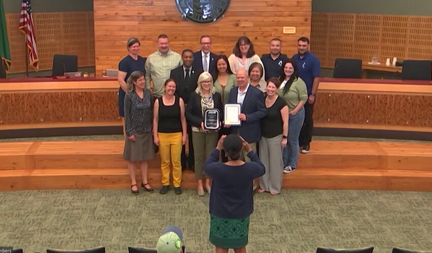 Olympia's Public Works Department receives the Project of the Year award from the American Public Works Association (APWA) for its Franklin Street improvements Project. APWA Washington chapter president Lauren Behm announced the award at the Olympia City Council meeting on Tuesday, May 16, 2023.