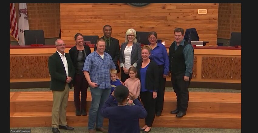 At Tuesday's June 21, 2023 meeting, Olympia City councilmembers posed with Parks, Arts, and Recreation Director Paul Simmons, who received a Washington Recreation and Park Association (WRPA) award.