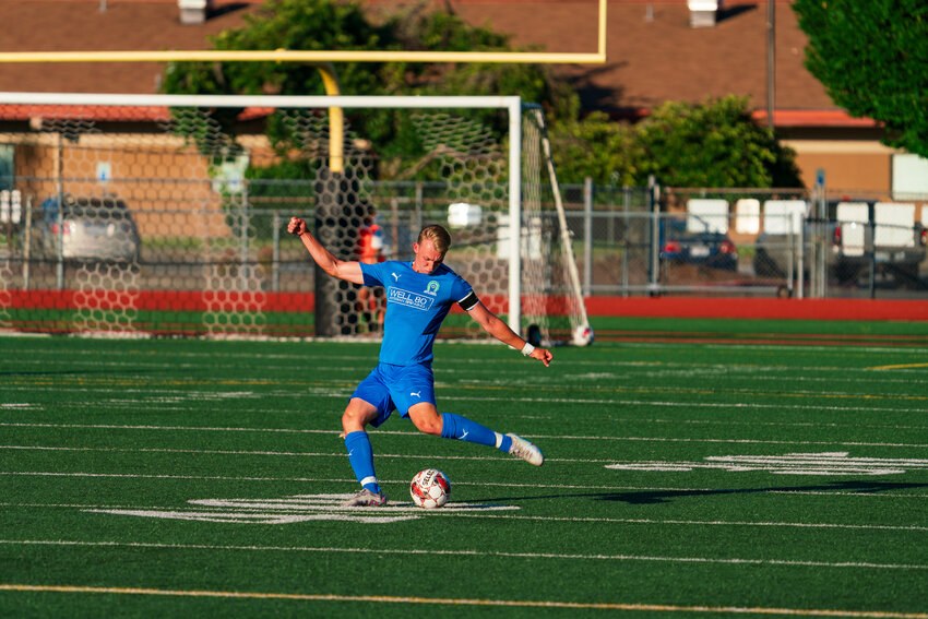 Oly Town FC captain Jack Sluys  in action.