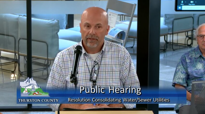 County Water Resources Manager Tim Wilson briefs the BoCC about the consolidation of community-level utility advisory committees.
