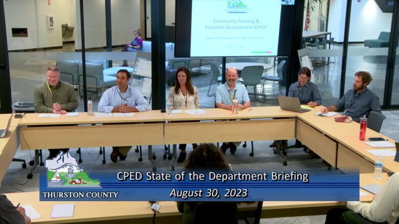 CPED Director Joshua Cummings (second from left) , presents his team to the Thurston County Commissioner, accompanied by members Brett Bures, Development Services Manager; Summer Miller, Fiscal Manager; Jeremy Davis, Operations Manager; Ashley Arai, CP Manager; and Stephen Bramwell from Washington State University Extension.