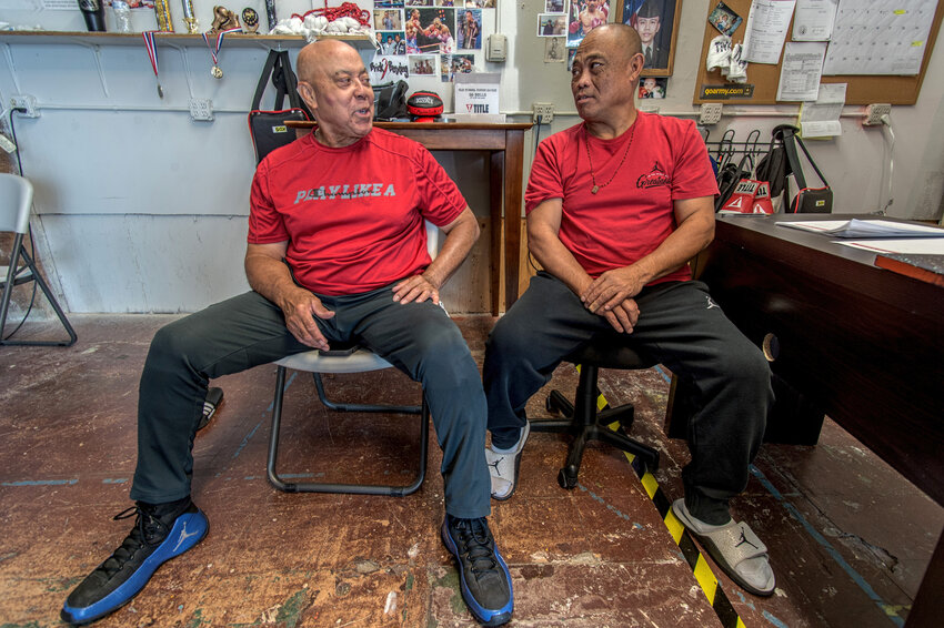 Ted Hohney and Vince Arevalo, owners of Brick3Boxing in downtown Olympia, provide not only a place to work out and learn boxing, they also help homeless people who stop by.