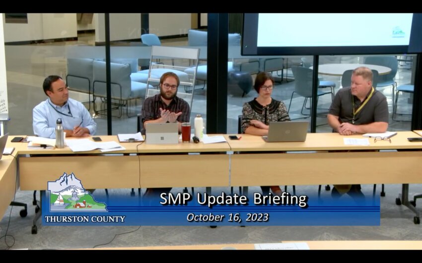 Senior Planner Andrew Deffobis (second person from the left) explained the shoreline variances, and sea level rise updates to the Board of County Commissioners (BoCC) yesterday, October 16.