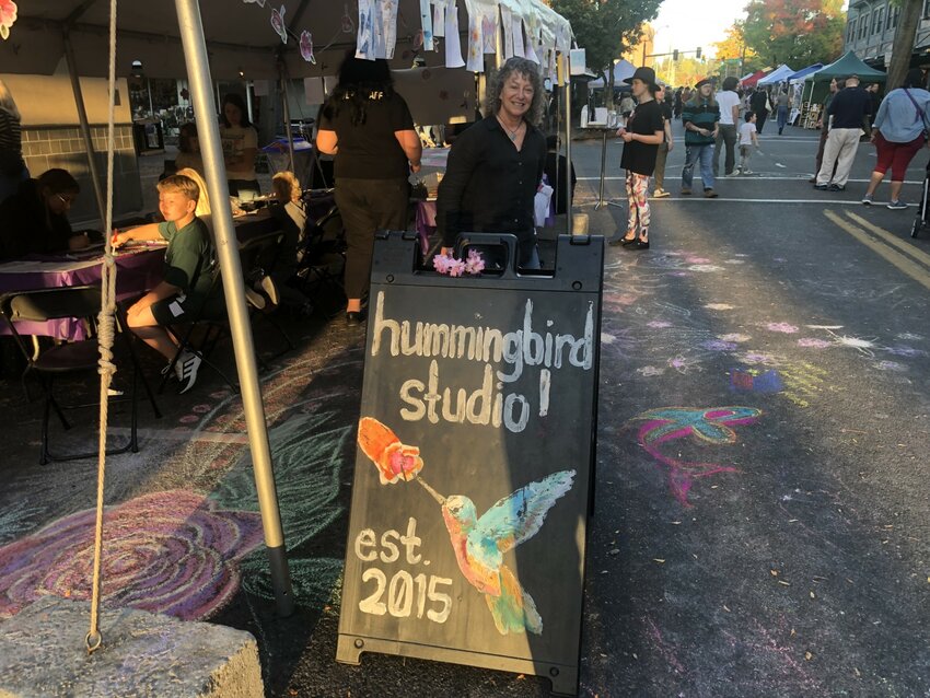 Hummingbird Studio, a program of Kokua Services, held a pop-up artists studio on Fifth Avenue at the Fall 2023 Olympia Arts Walk. Randi Miller, center, top, Hummingbird's program director, coordinated the day-long program.