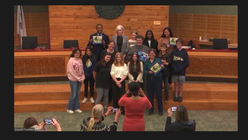 At the Olympia City Council meeting on Tuesday, October 17, 2023, councilmembers recognized 13 students from middle school whose artworks were featured in the 2024 Water Resources Stewardship Through Art calendar.