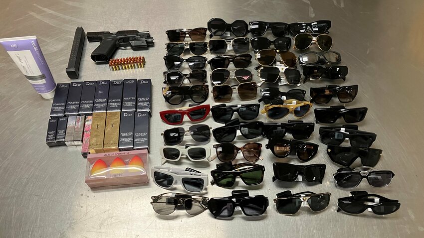 In the two female suspects&rsquo; possessions were 40 pairs of stolen designer sunglasses, along with suspected stolen cosmetics and a stolen firearm.