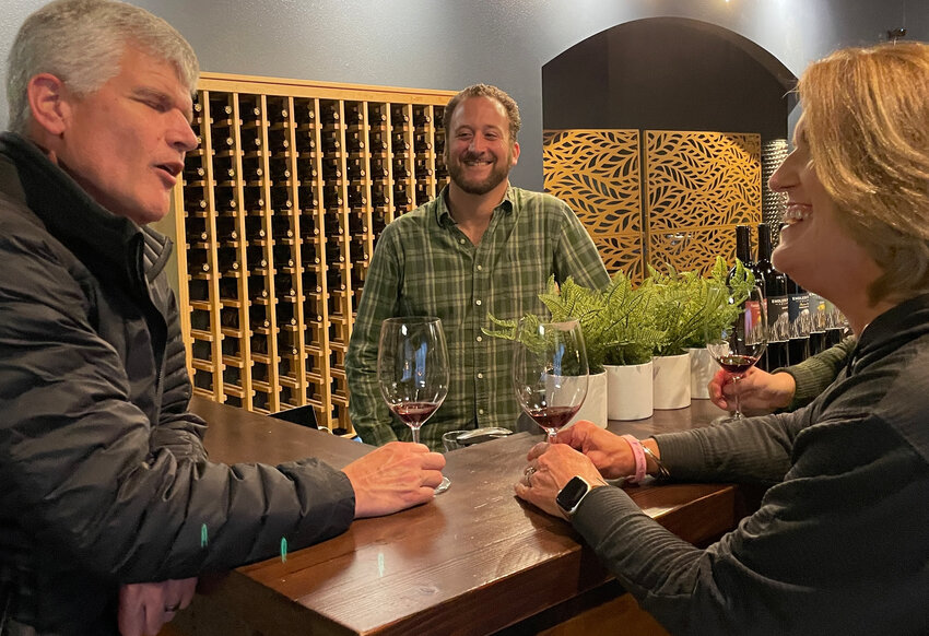 Pat and Helen Rants enjoy the personal tasting experience at Endless Sound Cellars with winemaker Mark Bosso.