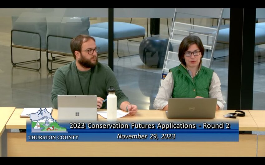 Senior Planner Andrew Deffobis (left) discussed the second cycle of the Conservation Futures Program with Thurston County&rsquo;s Board of County Commissioners yesterday, November 29.