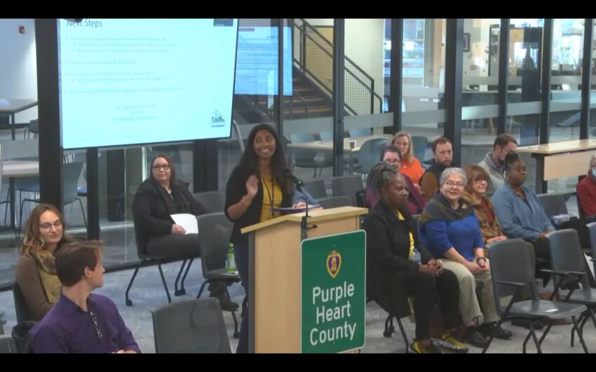 Last Tuesday, November 28, 2023, Racial Equity Program Manager Devi Ogden (podium) discussed Thurston County&rsquo;s Racial Equity Action Plan with the Board of County Commissioners (BoCC).