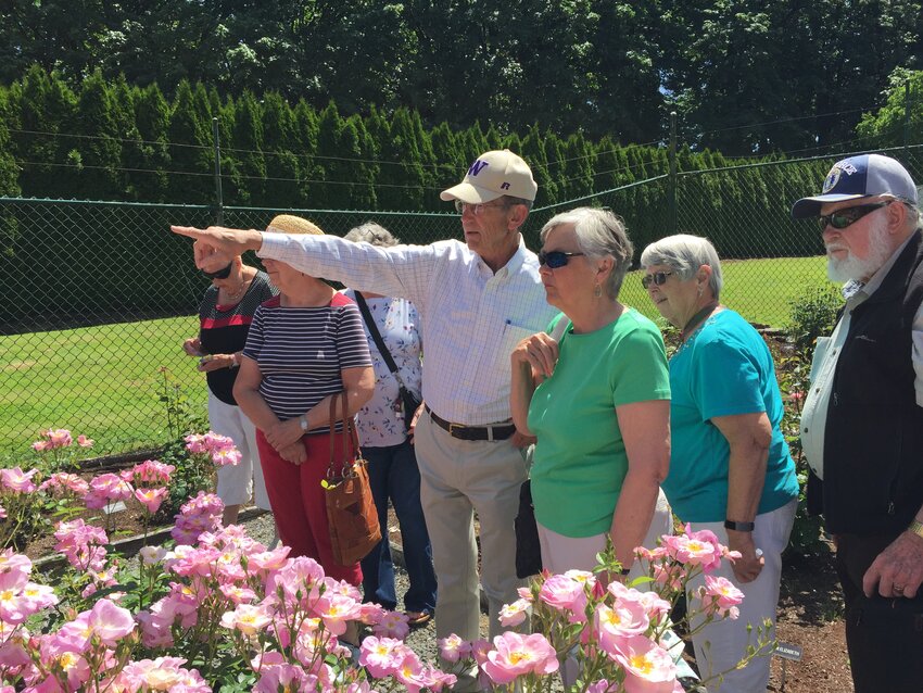 Gary with visitors at the Centennial Rose Garden.