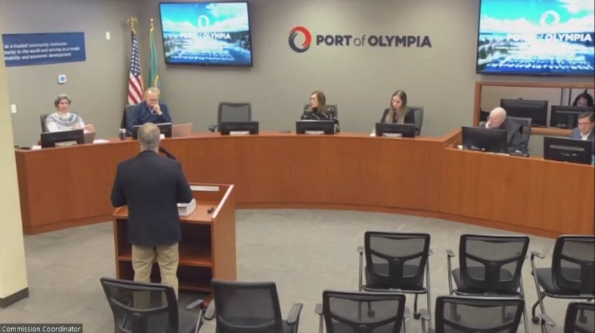 Environment Planning Director Shawn Gilberton (bottom left) gave the Port of Olympia Commission more information about Chris Reive&rsquo;s contract before it was amended as part of the consent agenda.