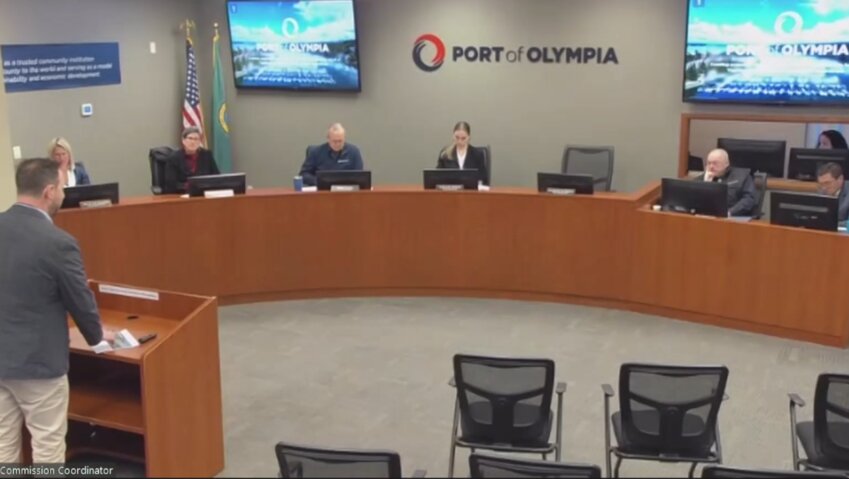 Human Resources Ben McDonald (bottom left) briefed the Port of Olympia Commission about an amendment to the contract of CSD Attorneys at Law.