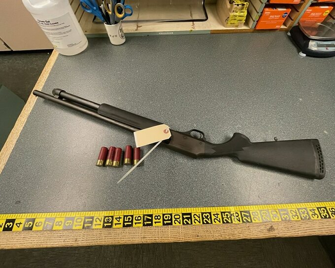 The shotgun allegedly used by the suspect on the victim was retrieved from the scene.