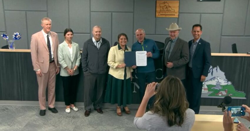 Eli Sterling, organizer of Procession of the Species, attended the Thurston Board of County Commissioners meeting on April 16, 2024 to receive the Earth Day proclamation.