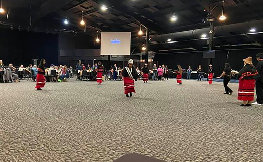 A performance by Yvette Duenas Aponte and Students from Chief Leschi Schools Culture Class at the South Puget Intertribal Planning Agency (SPIPA) Elders Supports and Services Event at the Little Creek Casino Convention Center. Permission was granted from SPIPA to take the picture.