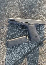 The Glock 21 handgun with one bullet loaded on the chamber was found under the suspect&rsquo;s pants on the left leg just above the knee.