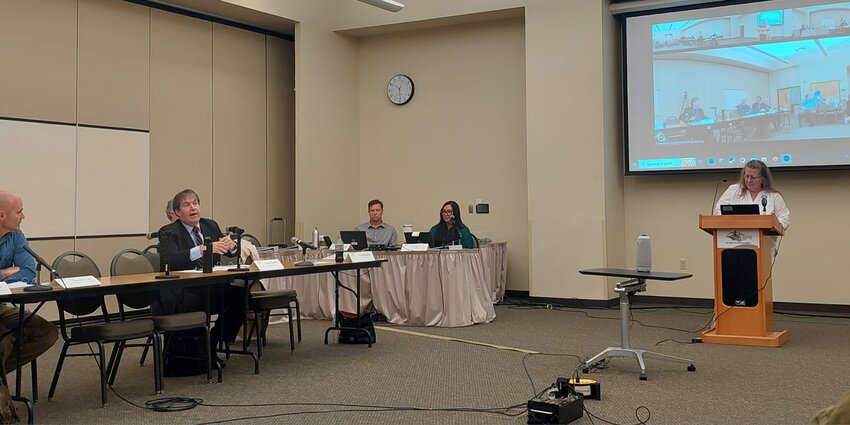 The Commercial Aviation Work Group (CAWG), meeting for the first time on Thursday, July 11, is tasked with resolving Washington’s projected aviation capacity shortage. Interim chairman Evan Nordby (left-center) addresses the group.