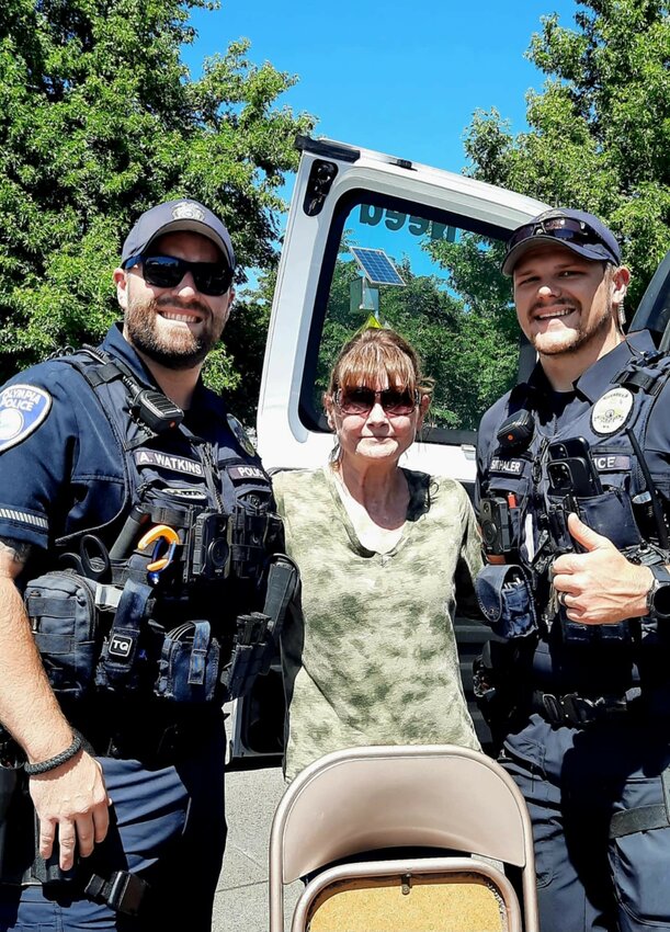 Two Olympia Police Officers assisted Nikki Freitas to wrap things up at Senior Day at Capital Lakefair on July 19, 2024.