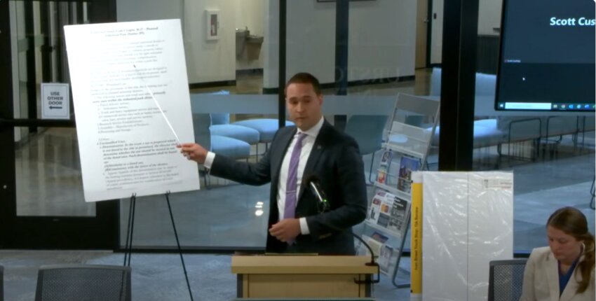 Ezra Hammer, an attorney representing the Chehalis Tribe, goes old-school with poster boards and a pointer as he presents the tribe&rsquo;s appeal during a quasi-judicial hearing on August 28, 2024. At issue is a proposed truck stop which has gained approval but which the tribe argues violates county code. Kristine Connolly, a Kittelson &amp; Associates Traffic Engineer, also spoke at the Thurston County BoCC work session.