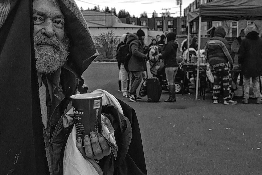 &quot;Hot Coffee on a Cold Morning,&quot; by JM Simpson, was recently selected by the Community Foundation of South Puget Sound for its Nonprofits in Action Award. The image focuses on Joyful Ministries program that provides a hot breakfast on Saturday mornings to anyone who comes to their pop-up kitchen in downtown Olympia.