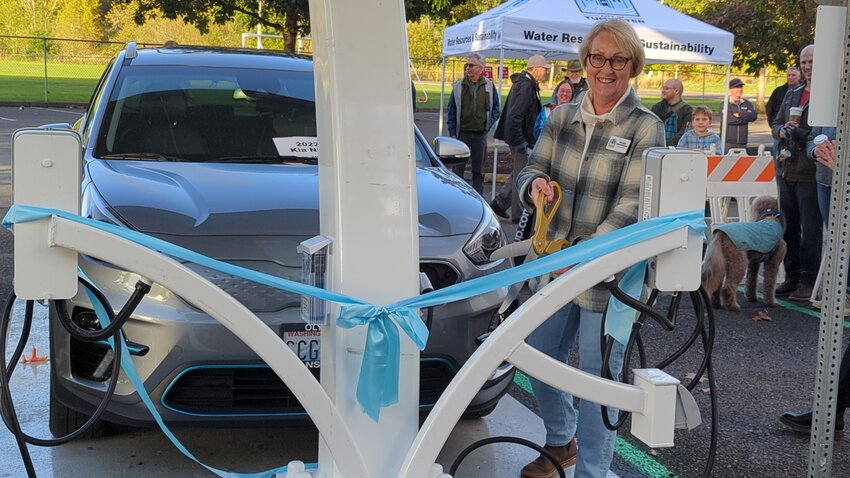 Tumwater City Councilmember Eileen Swarthout led a ribbon-cutting ceremony for the two EV charging stations on Friday, October 4.