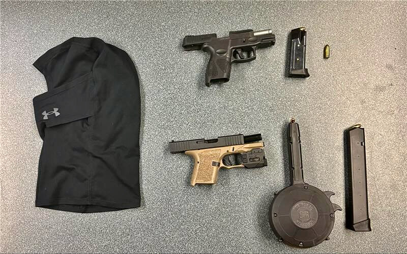 A shot of the weapons seized from a man who was arrested for the alleged armed robberies of massage parlors in Lacey and Olympia.