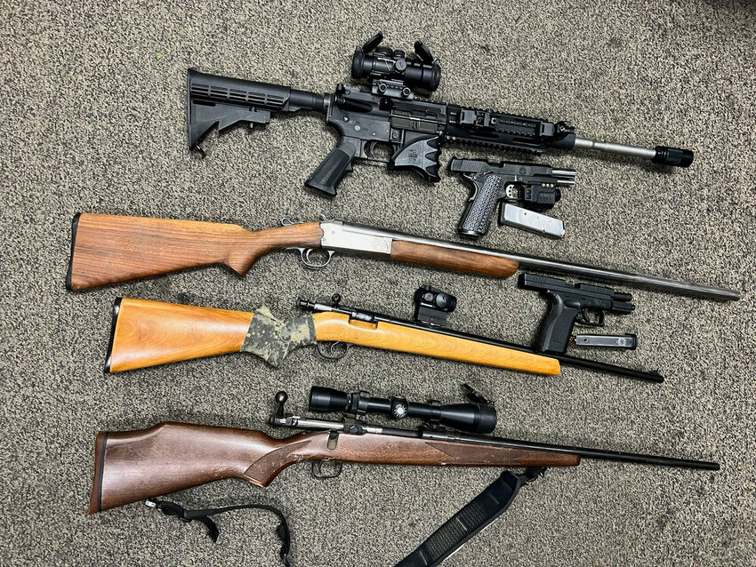 Multiple firearms, methamphetamine and drug paraphernalia were recovered from a suspect after authorities responded to his home on reports of him making threats of blowing another person up. 