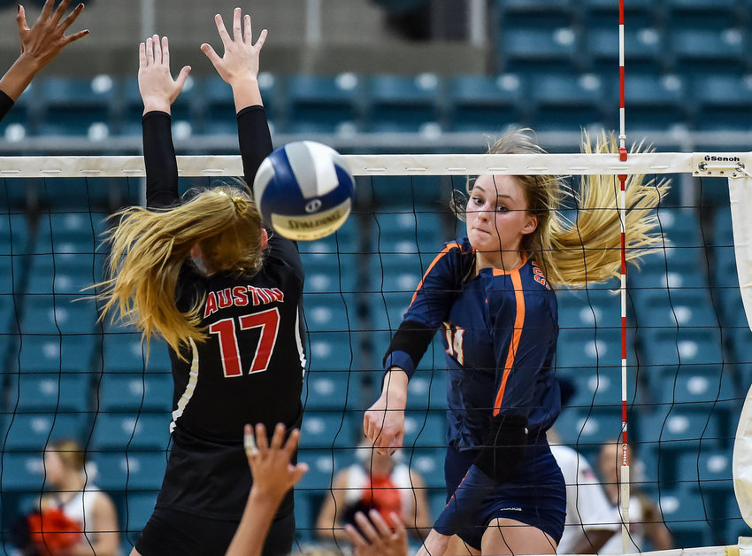 Seven Lakes&rsquo; Ally Batenhorst, voted the most outstanding hitter for District 19-6A last year, recently collected national preseason recognition from MaxPreps and the American Volleyball Coaches Association. Pictured is Batenhorst, 14, delivering a spike past Fort Bend Austin&rsquo;s Sydney Plemons, 17, during a high school volleyball playoff match at the Merrell Center in Katy on Nov. 5, 2019.