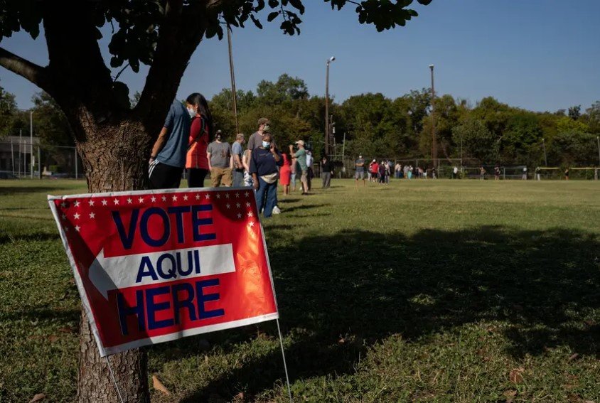 Voters wait to cast their ballot at the South Austin Recreation Center on the first day of early voting in Texas. Meanwhile, voting machines were temporarily down in Fort Bend County on Tuesday morning, but a county official said the problems were fixed by the afternoon.