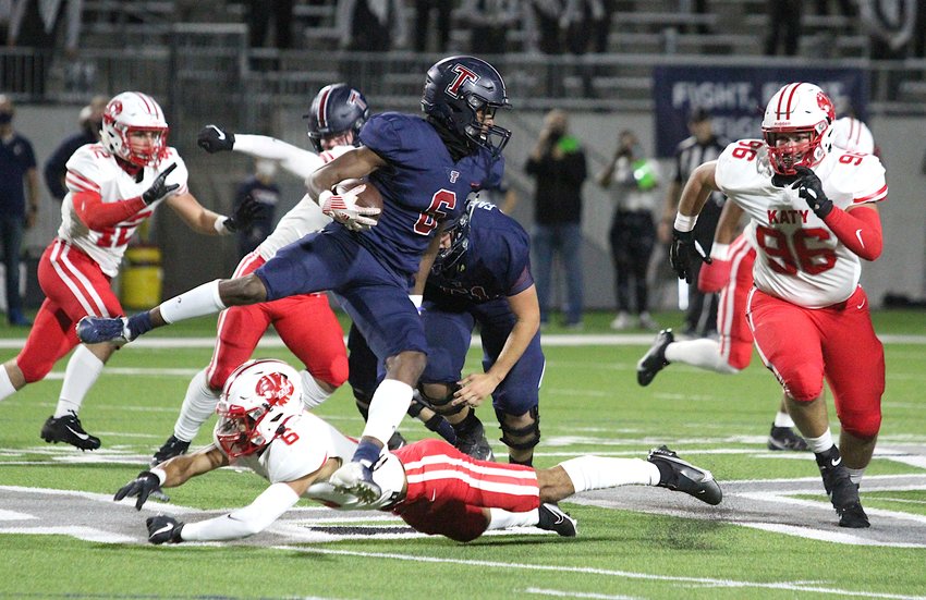 Tompkins senior running back Marquis Shoulders runs for yards during the Falcons' 24-19 win over Katy on Thursday evening at Legacy Stadium.