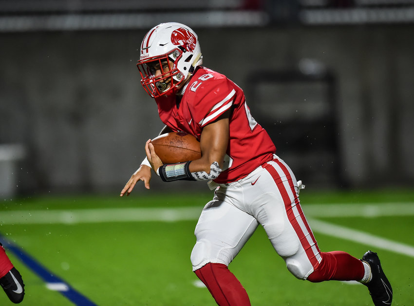 Katy High senior running back Jalen Davis rushed for 128 yards and a touchdown on 19 carries to help the Tigers to a 41-13 rout of Taylor on Nov. 12 at Rhodes Stadium.
