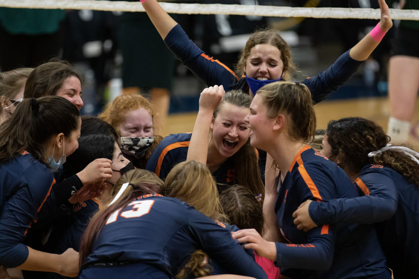 Seven Lakes players celebrate after beating San Antonio Reagan, 3-2, in their Class 6A state semifinal on Dec. 7 at the Merrell Center.