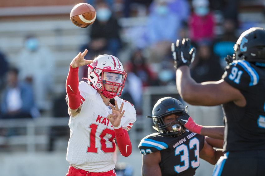 Katy High sophomore quarterback Caleb Koger (10) throws a pass during the Tigers&rsquo; 49-24 Class 6A-Division II regional semifinal win over Shadow Creek on Saturday, Dec. 26, at Freedom Field in Iowa Colony.