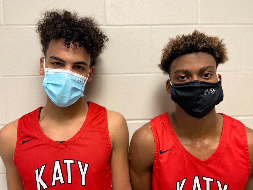 Katy High junior guard Dayvaughn Froe, left, and senior guard Ryon Johnson led an inspired defensive effort in the Tigers&rsquo; 76-52 win over Cinco Ranch on Tuesday, Jan. 19, at Cinco Ranch High.