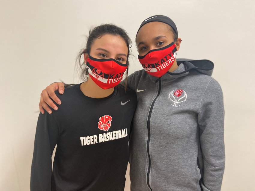 From left to right, Katy senior guards Sasha Fernandez and Amber Bourgeois combined for 18 points to help lead the Tigers to the playoffs courtesy of a 34-24 win over Taylor on Tuesday, Feb. 2, at Taylor High.