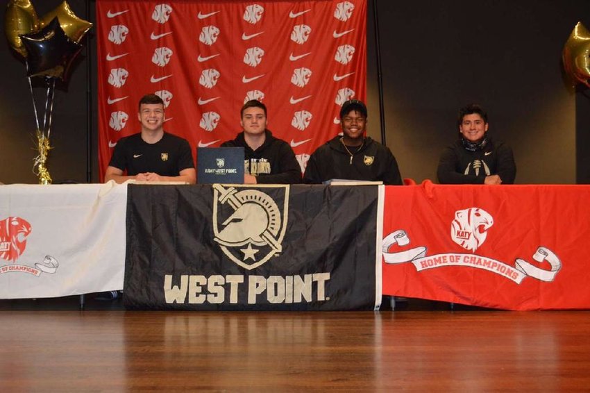 From left to right, Katy High senior linebacker Shepherd Bowling, Katy High senior offensive lineman Vasileios &ldquo;Bill&rdquo; Katsigiannis, Katy High senior offensive lineman Omarrian Aigbedion and Taylor senior running back Casey Shorter pose for a photo honoring their signing with Army West Point.