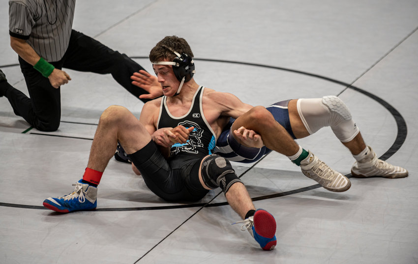 Paetow senior John Abney competes at the District 11-5A wrestling tournament on Wednesday, April 7, at the Merrell Center.