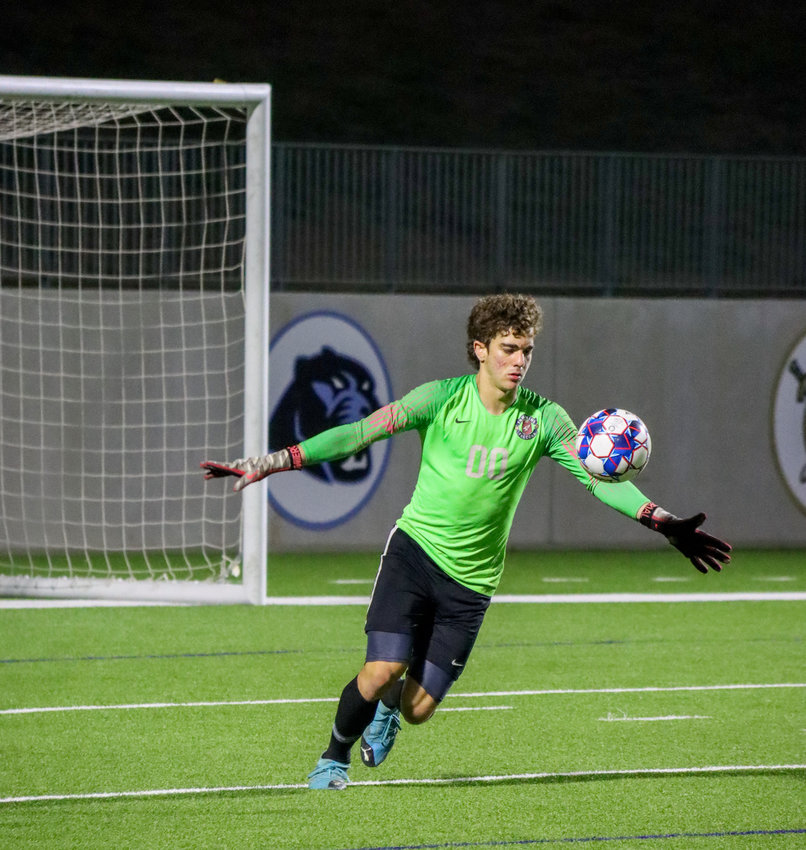 Tompkins senior goalkeeper Paulo Valente makes a stop on the ball during Tompkins&rsquo; Class 6A Region III final against Jersey Village on Friday, April 9, at Legacy Stadium.