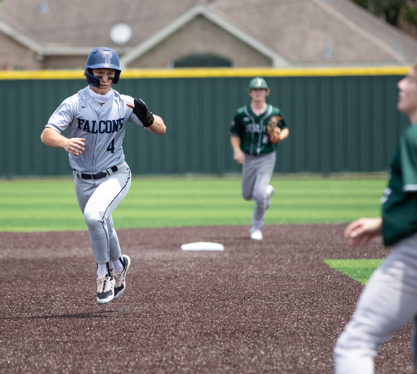 Tompkins senior Will Stark rounds past second base during the first inning of Game 3 of the Falcons&rsquo; Region III-6A semifinals against Strake Jesuit on Saturday, May 29, at Cy-Falls High. Stark eventually scored on an RBI groundout by Jace Laviolette.