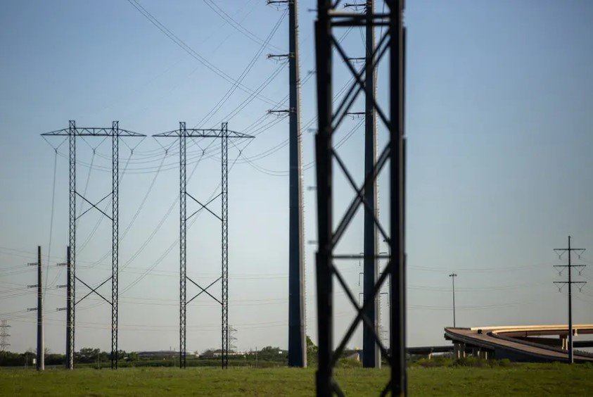 Electrical power lines near the Austin Energy/Sand Hill Energy Center in Del Valle are shown on March 24, 2020.