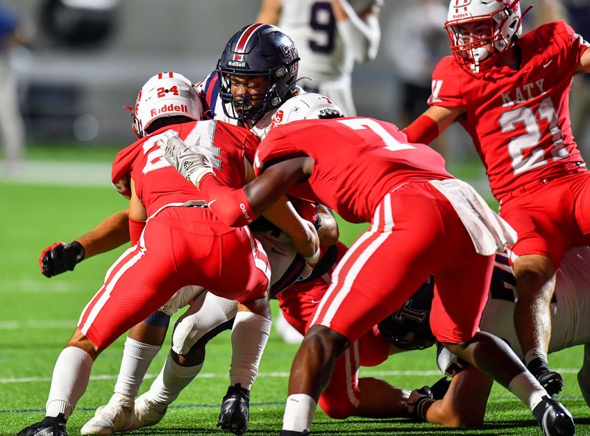 Katy, Tx. Oct 1, 2021:  On a fourth and goal, Katy's defense holds off Tompkins from scoring during a conference game between Katy Tigers and Tompkins Tompkins Falcons at Legacy Stadium. (Photo by Mark Goodman / Katy Times)